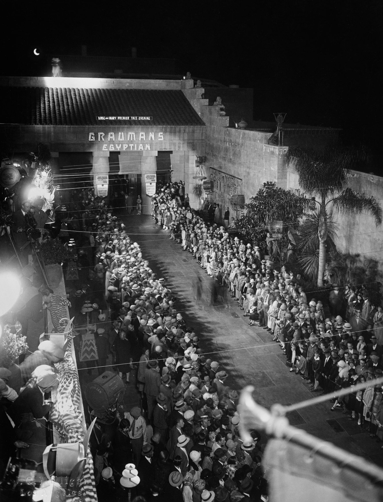 A dense crowd under the 'Doug and Mary Premiere' marquee at Grauman's Egyptian Theatre, Hollywood, May 14, 1926.